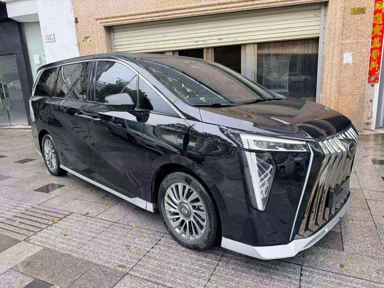 Black luxury MPV parked outdoors